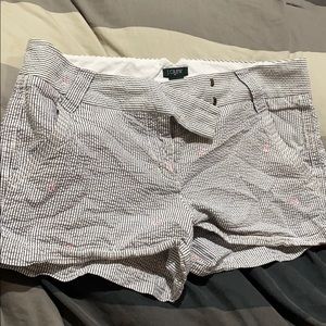 Navy shorts with light pink anchors